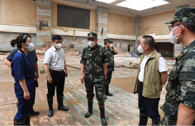 总队司令员黄锦明,政治委员黄明村,副司令员马俊东,参谋长郝光荣等